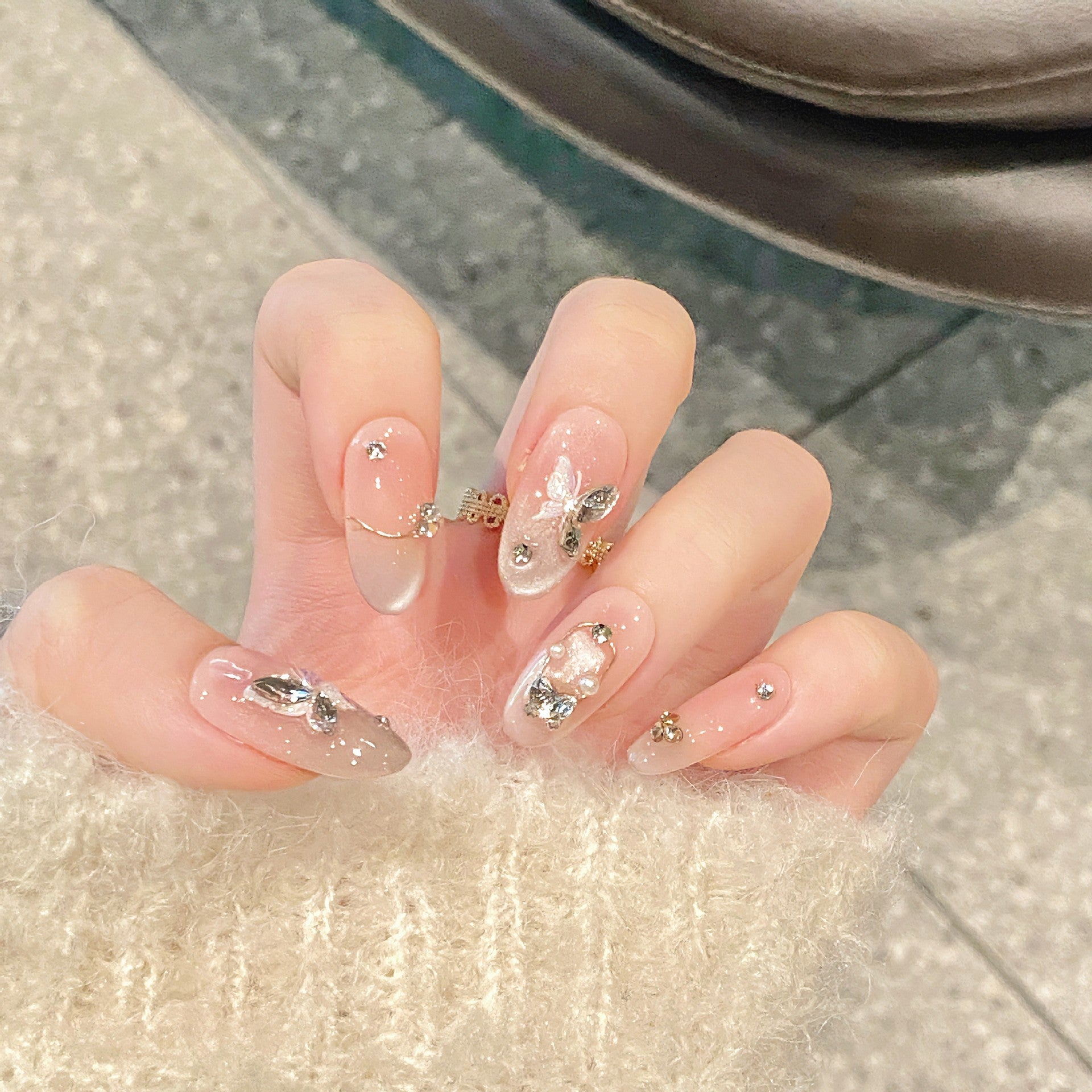 Handmade Press On Nails Medium Almond Wings of a dish