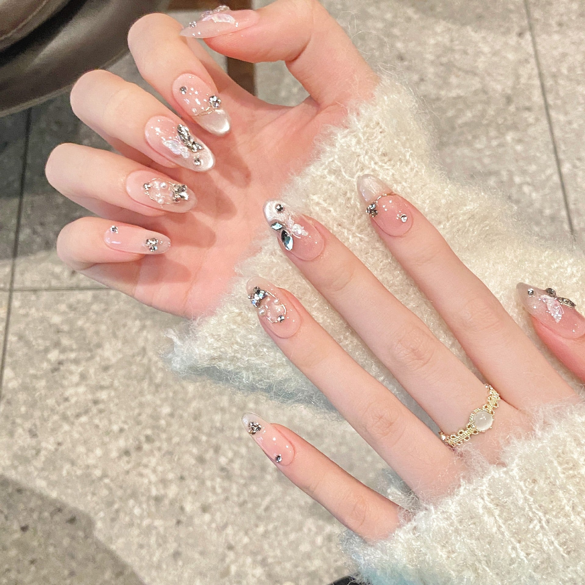 Handmade Press On Nails Medium Almond Wings of a dish